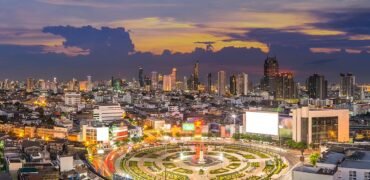 Panorama of Bangkok cityscape at Wongwian Ya roundabout at twilight time, Bangkok, Thailand